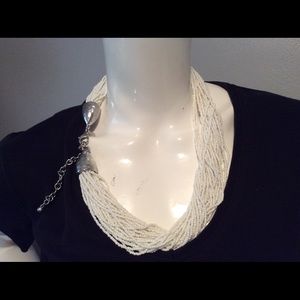 Multi strand white stone necklace